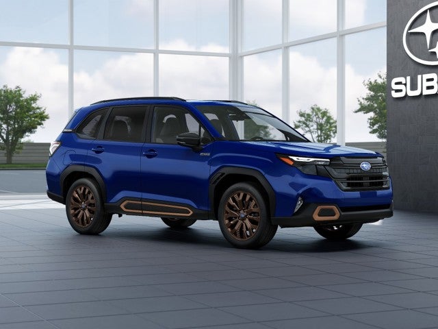 2026 Subaru FORESTER Sport Hybrid in Sapphire Blue Pearl — front three-quarter view