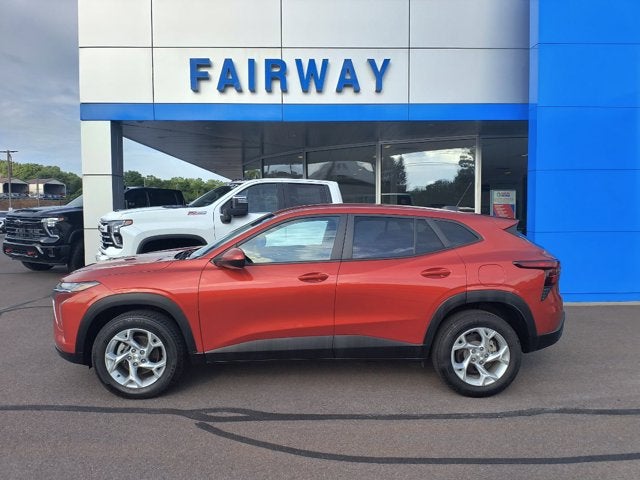 2024 Chevrolet Trax LS in Cayenne Orange Metallic — front three-quarter view