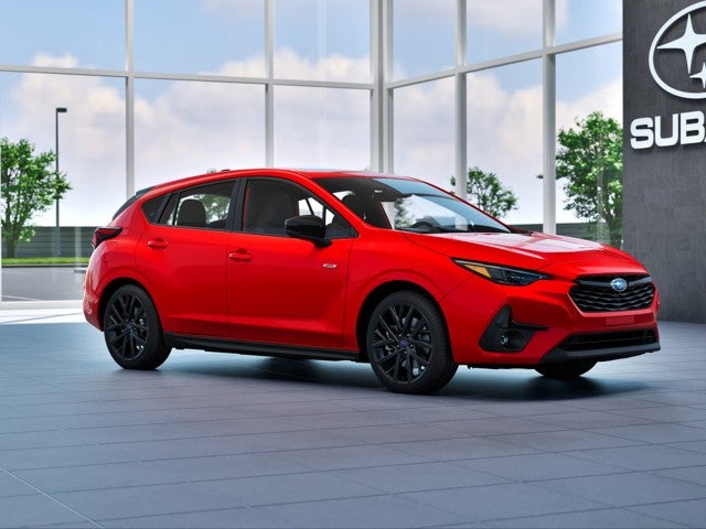 2026 Subaru IMPREZA RS in Pure Red — front three-quarter view